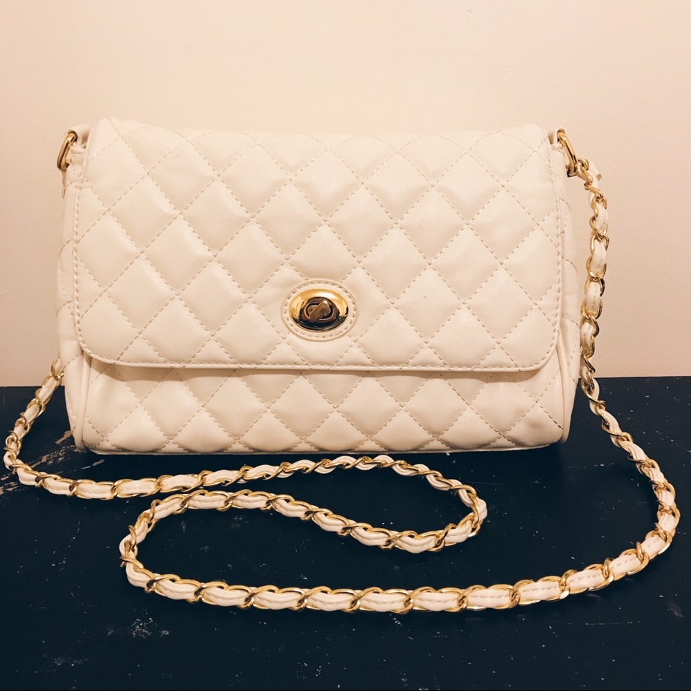 White quilted flap shoulder bag